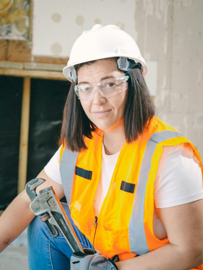 International Women's Day 2025: a woman on a construction site wearing protective gears