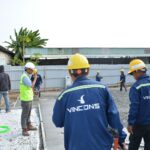 Construction workers in high-visibility gear on an Australian worksite