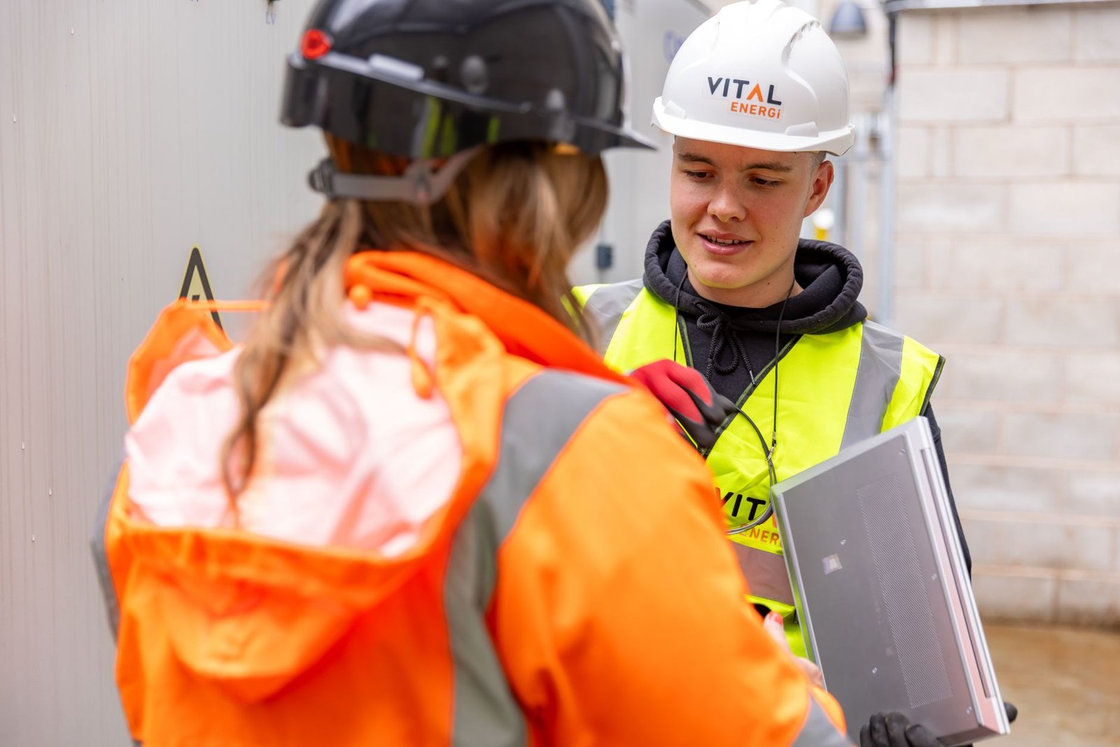 A construction crew during a site safety discussion