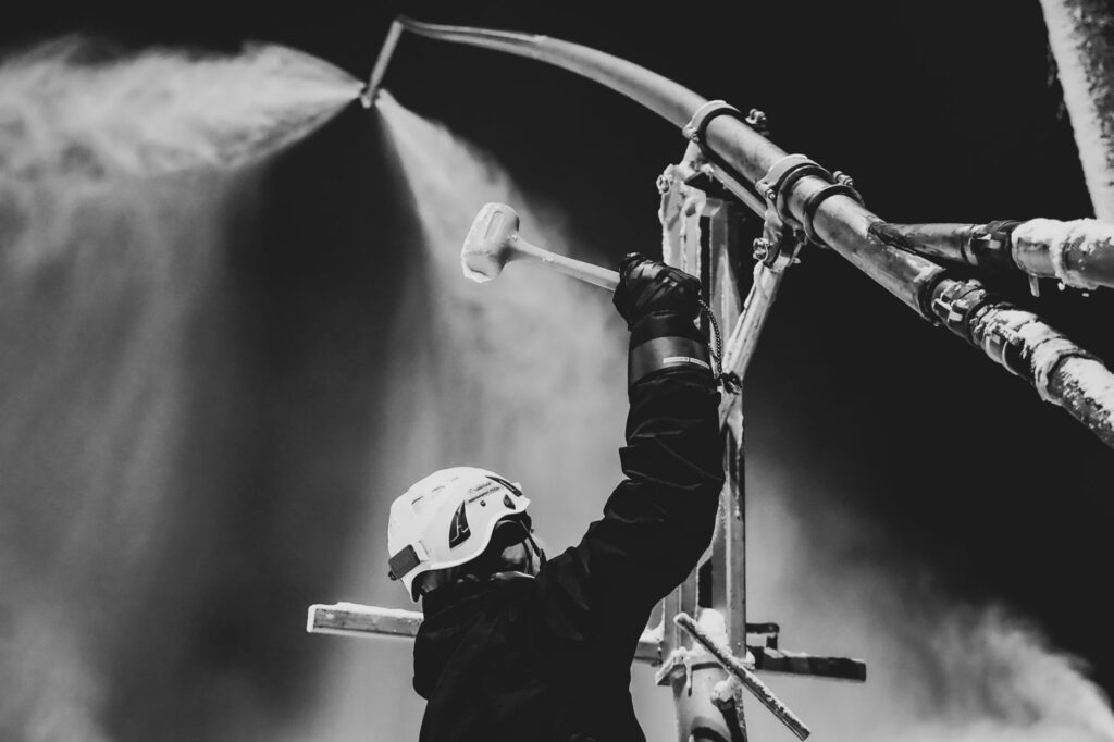 A construction supervisor under deadline pressure on a busy site