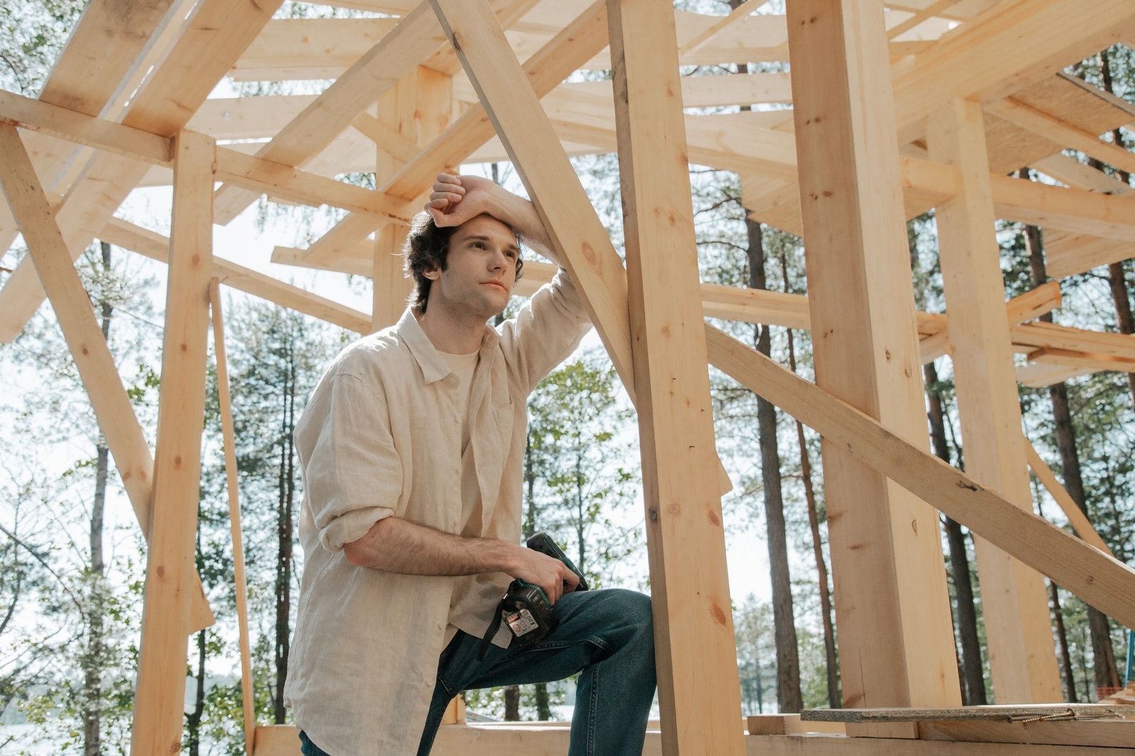 A construction worker standing alone on site